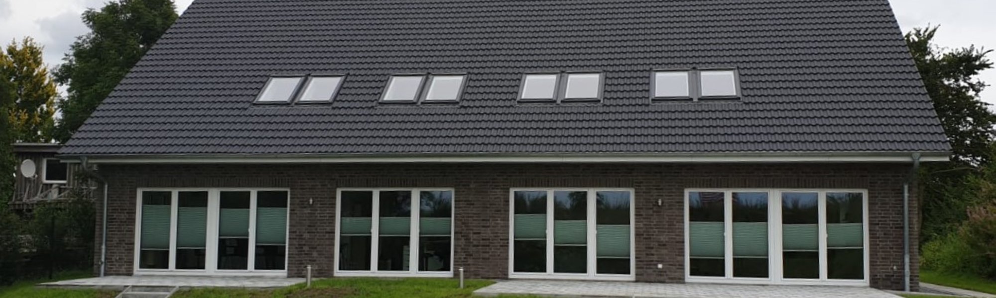 Ein Generationshaus mit Terrasse 